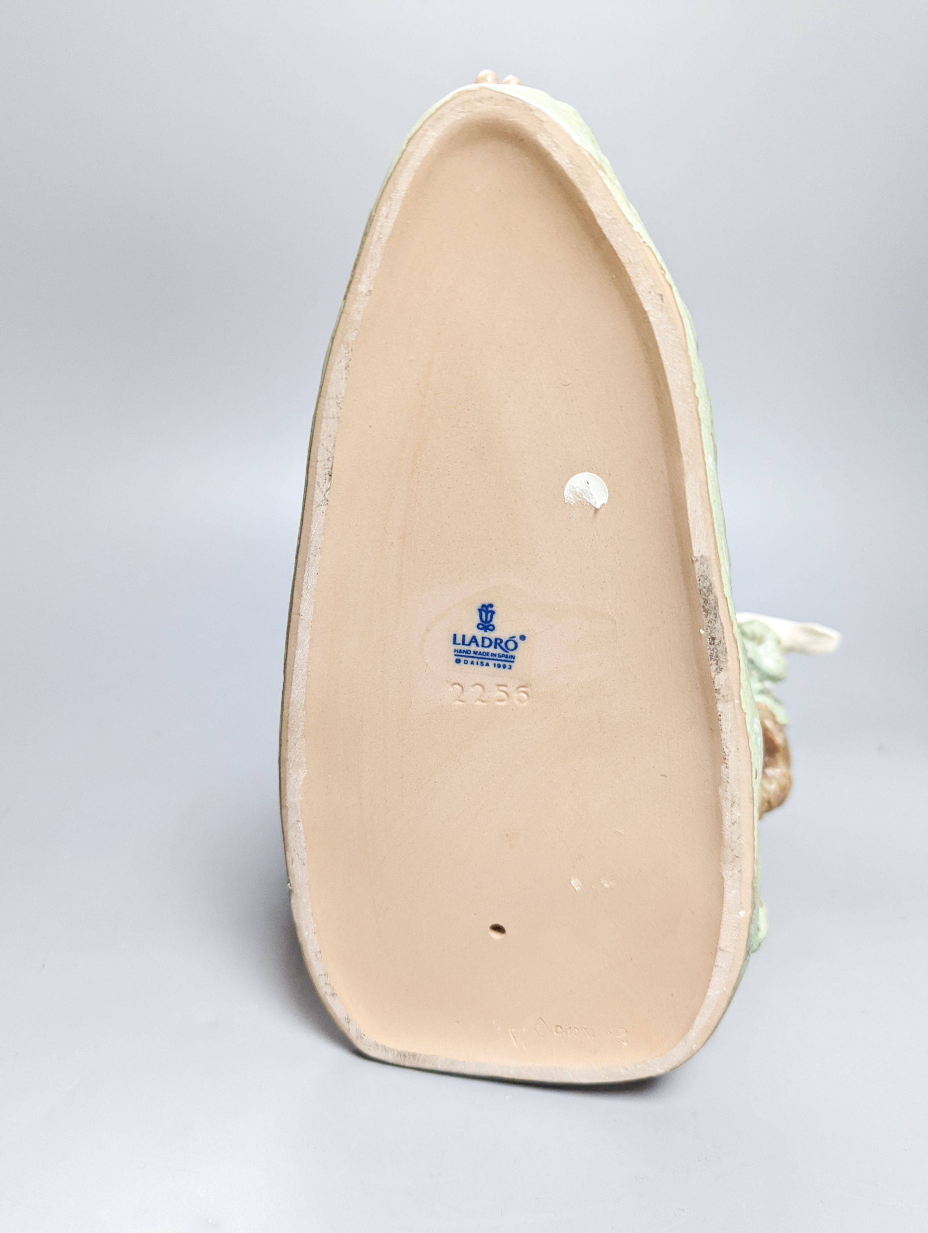 A Lladro stoneware figurine ‘Solitude’, Height 34cm. Width 25cm.